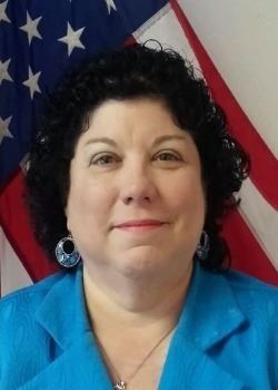 FINANCE DIRECTOR CARON VELA